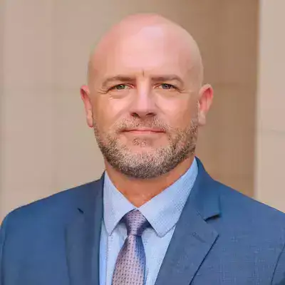 Adam E. Brigman